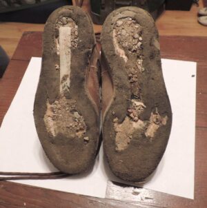 The bottoms of the boots after we got home. You can see one of the metal arch supports fell out and just the insole was still intact.