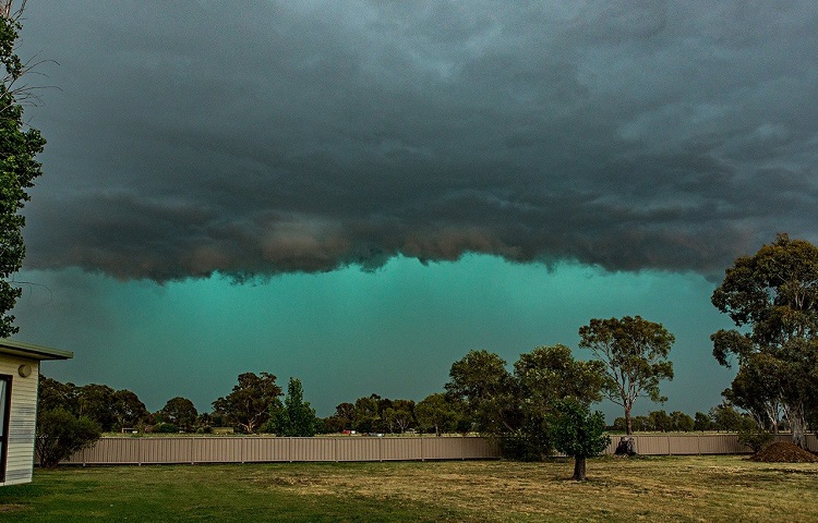 Why does the sky look green before a tornado?